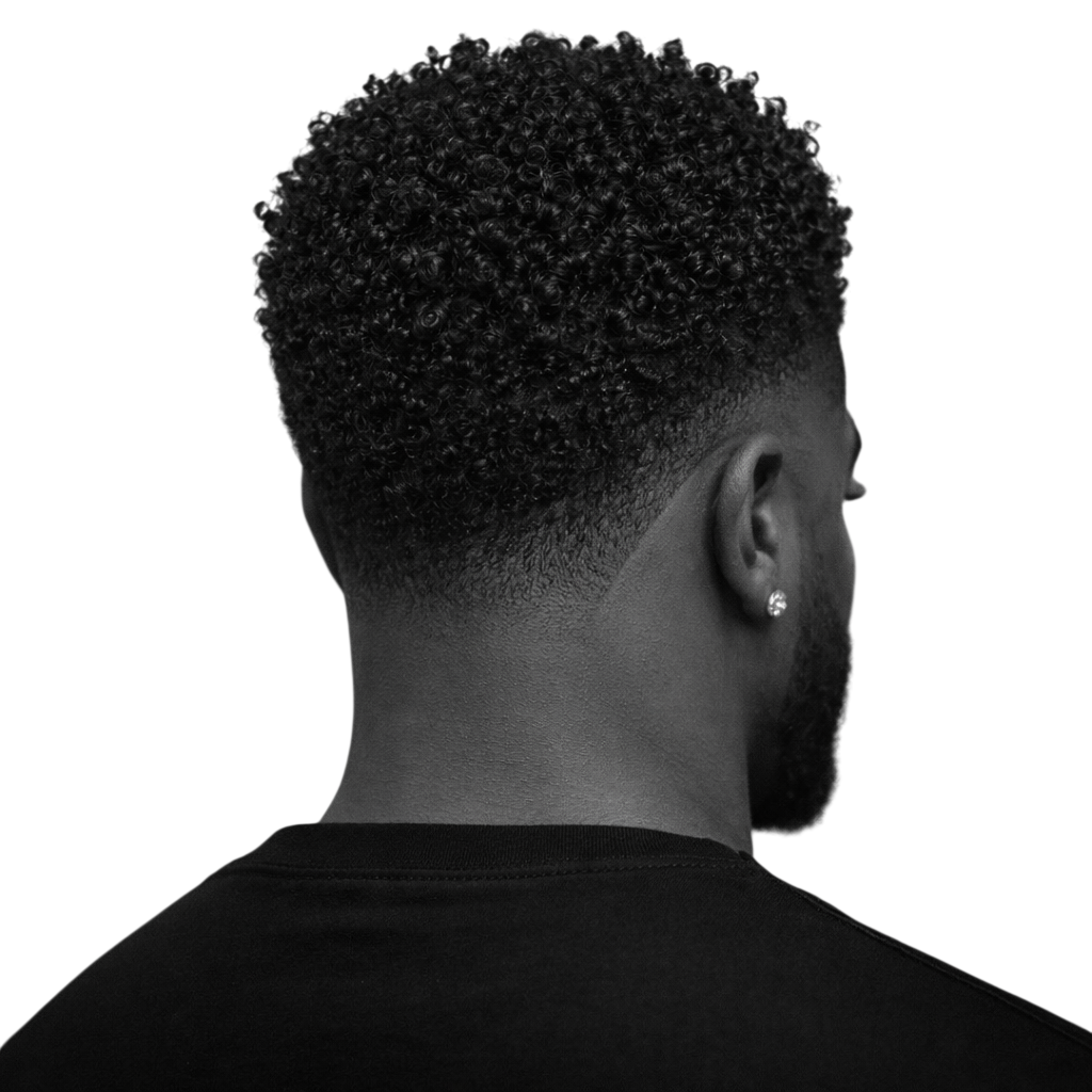 Mid-Length Curly Crop with Mid Drop Skin Fade